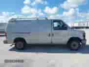 2014 Ford Econoline Cargo Commercial with VIN 1FTNE1EW4EDB05697, listed as a IAAI auction lot 42899014 with 216,329 mi miles and . Bid and sale history available at DreamBid. Image 13.