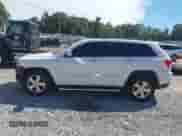 2013 Jeep Grand Cherokee Limited z VIN 1C4RJFBG8DC556272, wystawiony jako IAAI lot #43352592 z przebiegiem 118 793 mil mil oraz . Historia ofert i sprzedaży dostępna na DreamBid. Obrazek 14.