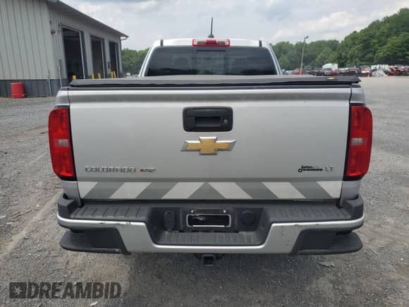 2018 Chevrolet Colorado 4WD LT z VIN 1GCHTCENXJ1157689, wystawiony jako Copart lot #63977175 z przebiegiem 27 830 mil mil oraz Szkoda całkowita • Salvage title. Historia ofert i sprzedaży dostępna na DreamBid. Obrazek 6.