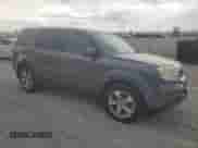 2015 Honda Pilot EX-L with VIN 5FNYF3H74FB009086, listed as a Copart auction lot 54887975 with 117,036 mi miles and Salvage title. Bid and sale history available at DreamBid. Image 4.