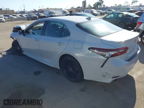 2023 Toyota Camry Hybrid XSE с VIN 4T1K31AK8PU052738, выставлен на аукционе IAAI как лот 43315522 с пробегом 93 968 миль миль и . История ставок и продаж доступна на DreamBid. Изображение 3.