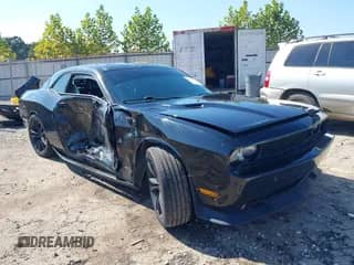 2012 Dodge Challenger R/T Plus with VIN 2C3CDYBTXCH137653, listed as a IAAI auction lot 43370417 with Not provided miles and . Bid and sale history available at DreamBid. Image 1.
