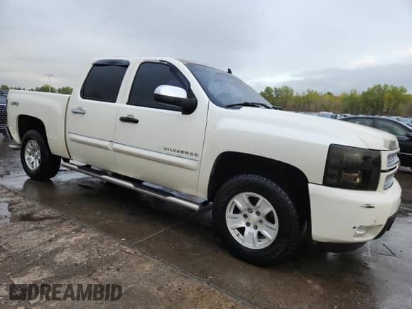 2013 Chevrolet Silverado 1500 LTZ with VIN 3GCPKTE72DG131724, listed as a Copart auction lot 82139705 with 183,083 mi miles and Salvage title. Bid and sale history available at DreamBid. Image 4.