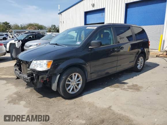 2016 Dodge Grand Caravan SXT with VIN 2C4RDGCGXGR339846, listed as a Copart auction lot 82103665 with 131,716 mi miles and Salvage title. Bid and sale history available at DreamBid. Image 1.