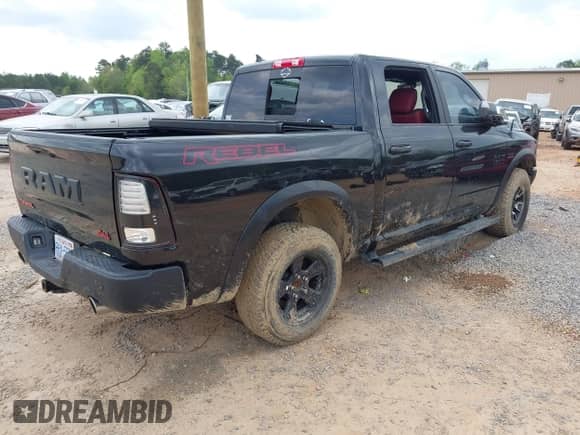 2018 Ram 1500 Rebel with VIN 1C6RR7YT4JS151036, listed as a IAAI auction lot 41988370 with 72,587 mi miles and . Bid and sale history available at DreamBid. Image 4.