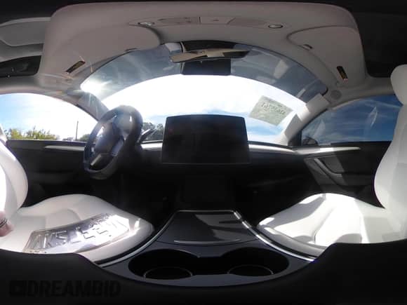 2023 Tesla Model Y Long Range z VIN 7SAYGAEE8PF880355, wystawiony jako IAAI lot #42635761 z przebiegiem 57 442 mil mil oraz . Historia ofert i sprzedaży dostępna na DreamBid. Obrazek 21.
