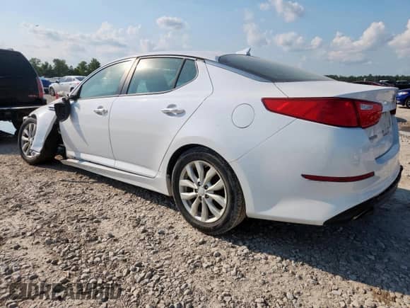 2014 Kia Optima LX z VIN 5XXGM4A75EG340529, wystawiony jako Copart lot #80566135 z przebiegiem 172 657 mil mil oraz Czysty tytuł • Clean title. Historia ofert i sprzedaży dostępna na DreamBid. Obrazek 2.