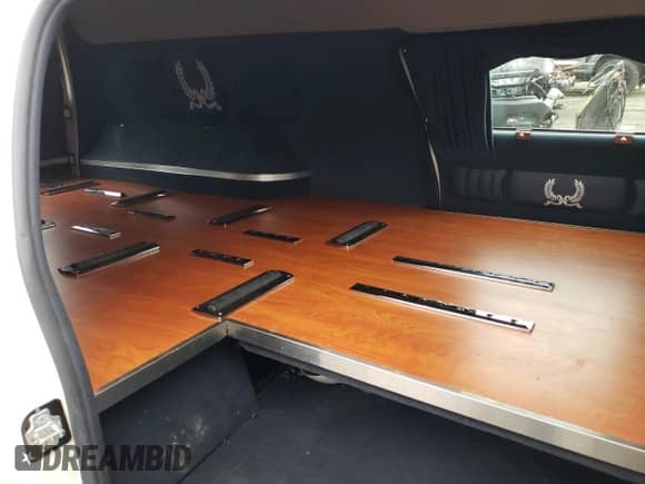 2006 Cadillac DTS Professional z VIN 1GEEH06Y56U500692, wystawiony jako Copart lot #56546565 z przebiegiem 26 810 mil mil oraz Szkoda całkowita • Salvage title. Historia ofert i sprzedaży dostępna na DreamBid. Obrazek 10.