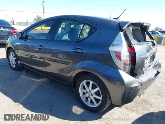 2013 Toyota Prius Three with VIN JTDKDTB32D1037041, listed as a IAAI auction lot 43401357 with 117,651 mi miles and . Bid and sale history available at DreamBid. Image 3.