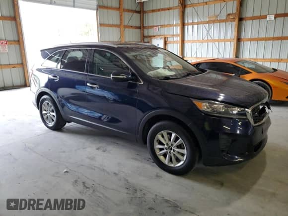 2020 Kia Sorento LX с VIN 5XYPG4A31LG698112, выставлен на аукционе Copart как лот 81651955 с пробегом 98 054 миль миль и Списание • Salvage title. История ставок и продаж доступна на DreamBid. Изображение 4.