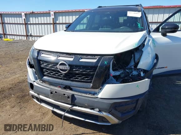 2023 Nissan Pathfinder Rock Creek with VIN 5N1DR3BD2PC270554, listed as a IAAI auction lot 42200457 with 18,249 mi miles and . Bid and sale history available at DreamBid. Image 6.