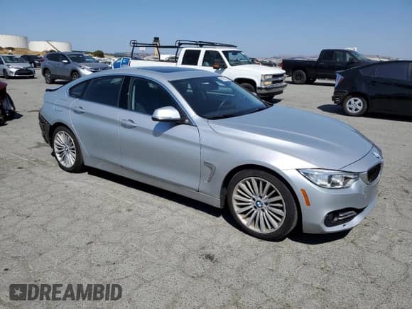 2015 BMW 4 Series 428i z VIN WBA4A9C52FGL86475, wystawiony jako Copart lot #70257175 z przebiegiem 51 357 mil mil oraz Szkoda całkowita • Salvage title. Historia ofert i sprzedaży dostępna na DreamBid. Obrazek 4.