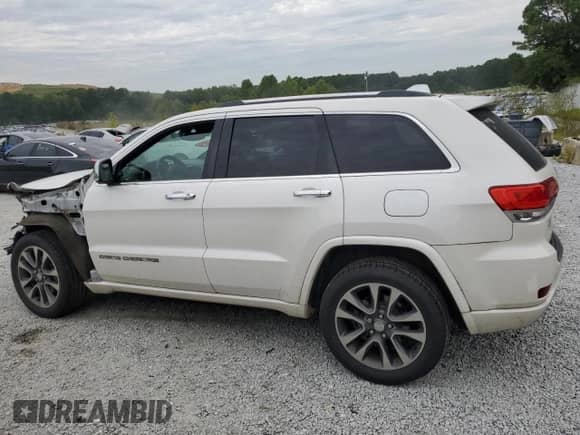 2017 Jeep Grand Cherokee Overland with VIN 1C4RJECG1HC773855, listed as a Copart auction lot 70180755 with 123,525 mi miles and Salvage title. Bid and sale history available at DreamBid. Image 2.