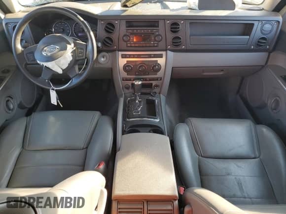 2006 Jeep Commander z VIN 1J8HH48K56C355688, wystawiony jako Copart lot #85169995 z przebiegiem 178 688 mil mil oraz Szkoda całkowita • Salvage title. Historia ofert i sprzedaży dostępna na DreamBid. Obrazek 8.