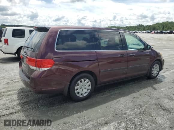 2008 Honda Odyssey LX с VIN 5FNRL38288B116128, выставлен на аукционе Copart как лот 68338135 с пробегом 128 485 миль миль и Списание • Salvage title. История ставок и продаж доступна на DreamBid. Изображение 3.
