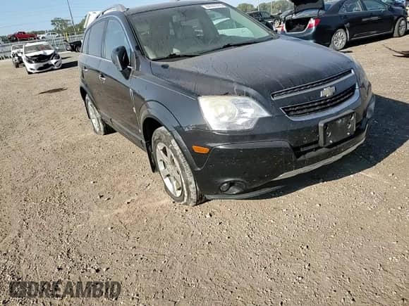 2012 Chevrolet Captiva Sport LTZ с VIN 3GNFL4E5XCS544197, выставлен на аукционе Copart как лот 84391975 с пробегом 172 857 миль миль и Списание • Salvage title. История ставок и продаж доступна на DreamBid. Изображение 14.