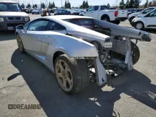2004 Lamborghini Gallardo с VIN ZHWGU11M94LA01754, выставлен на аукционе Copart как лот 67935984 с пробегом 17 188 миль миль и Списание • Salvage title. История ставок и продаж доступна на DreamBid. Изображение 2.