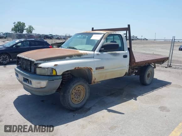 1998 Dodge RAM with VIN 3B7KF26D3WM211325, listed as a IAAI auction lot 42485953 with Not provided miles and . Bid and sale history available at DreamBid. Image 2.
