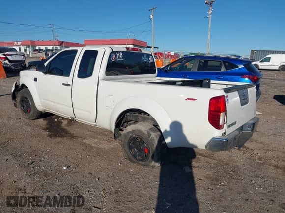 2015 Nissan Frontier S with VIN 1N6BD0CT0FN745410, listed as a IAAI auction lot 43394333 with 209,865 mi miles and . Bid and sale history available at DreamBid. Image 3.