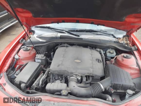 2012 Chevrolet Camaro 1LS z VIN 2G1FE1E32C9176796, wystawiony jako IAAI lot #43328686 z przebiegiem 183 464 mil mil oraz . Historia ofert i sprzedaży dostępna na DreamBid. Obrazek 10.