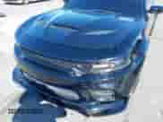 2023 Dodge Charger Scat Pack with VIN 2C3CDXGJ4PH584373, listed as a IAAI auction lot 43016093 with 33,016 mi miles and . Bid and sale history available at DreamBid. Image 6.