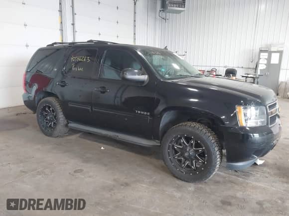 2014 Chevrolet Tahoe LT with VIN 1GNSCBE07ER249202, listed as a IAAI auction lot 42546283 with 124,538 mi miles and . Bid and sale history available at DreamBid. Image 1.