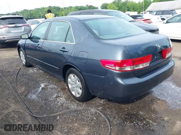 2003 Honda Accord LX with VIN 1HGCM55343A011455, listed as a IAAI auction lot 42434929 with 129,833 mi miles and . Bid and sale history available at DreamBid. Image 3.
