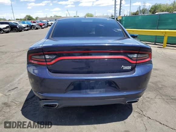2015 Dodge Charger SE with VIN 2C3CDXFG3FH815378, listed as a Copart auction lot 57861125 with 135,452 mi miles and Salvage title. Bid and sale history available at DreamBid. Image 6.