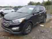 2014 Hyundai Santa Fe with VIN 5XYZU3LB9EG128927, listed as a IAAI auction lot 43299675 with 81,868 mi miles and . Bid and sale history available at DreamBid. Image 2.
