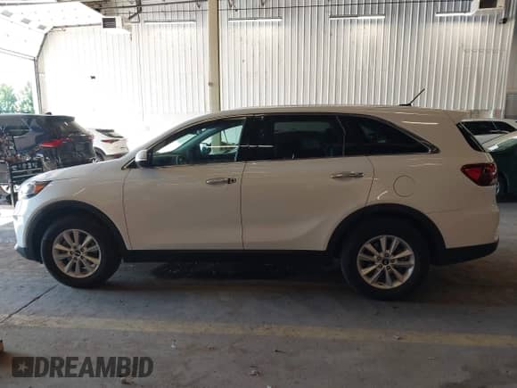 2019 Kia Sorento LX with VIN 5XYPG4A59KG561290, listed as a IAAI auction lot 42674023 with 78,091 mi miles and . Bid and sale history available at DreamBid. Image 14.