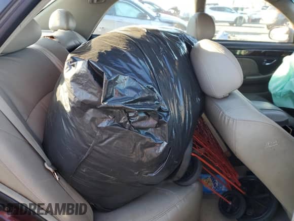2002 Hyundai XG L с VIN KMHFU45E52A181308, выставлен на аукционе Copart как лот 82834594 с пробегом Не указан миль и Списание • Salvage title. История ставок и продаж доступна на DreamBid. Изображение 10.