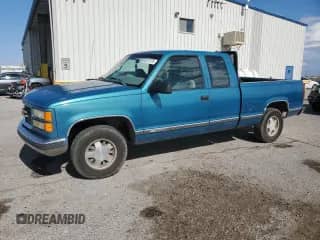 1997 GMC Sierra 1500 z VIN 1GTEC19R1VE528502, wystawiony jako Copart lot #65173775 z przebiegiem 153 295 mil mil oraz Szkoda całkowita • Salvage title. Historia ofert i sprzedaży dostępna na DreamBid. Obrazek 1.