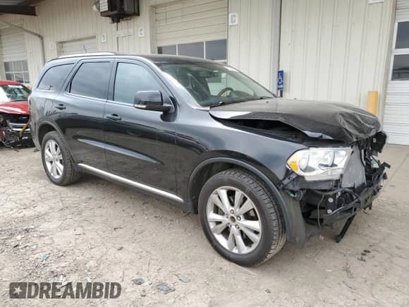 2012 Dodge Durango Crew with VIN 1C4SDJDT8CC358831, listed as a Copart auction lot 53525415 with 120,481 mi miles and Salvage title. Bid and sale history available at DreamBid. Image 4.