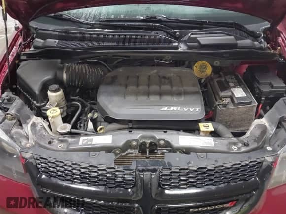 2018 Dodge Grand Caravan SE Plus with VIN 2C4RDGBG4JR220411, listed as a IAAI auction lot 41280371 with 144,766 mi miles and . Bid and sale history available at DreamBid. Image 10.