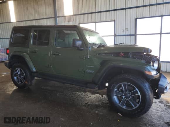 2023 Jeep Wrangler Sahara Altitude with VIN 1C4HJXEG7PW673485, listed as a Copart auction lot 41651795 with Not provided miles and Clean title. Bid and sale history available at DreamBid. Image 4.