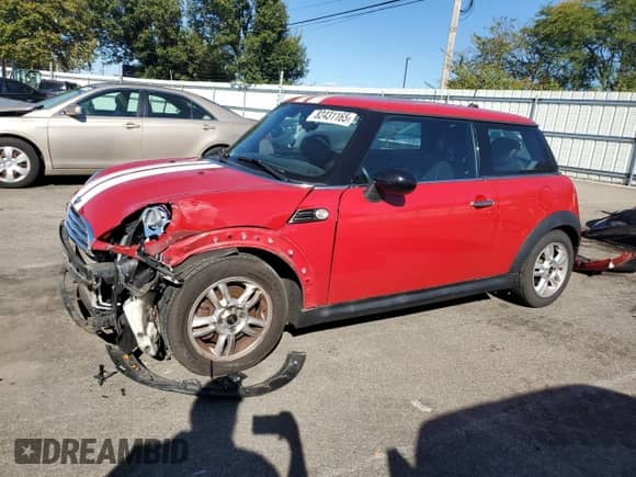 2013 MINI Hardtop with VIN WMWSU3C52DT370051, listed as a Copart auction lot 82431165 with 68,570 mi miles and Salvage title. Bid and sale history available at DreamBid. Image 1.