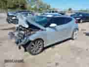 2012 Hyundai Veloster w/Black Int z VIN KMHTC6ADXCU036070, wystawiony jako IAAI lot #41779990 z przebiegiem Nie podano mil oraz . Historia ofert i sprzedaży dostępna na DreamBid. Obrazek 17.
