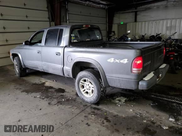 2003 Dodge Dakota Sport with VIN 1D7HG38X43S229006, listed as a Copart auction lot 44932005 with 226,935 mi miles and Salvage title. Bid and sale history available at DreamBid. Image 2.