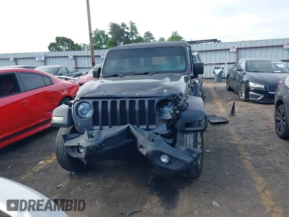2020 Jeep Wrangler Sport S with VIN 1C4GJXAG9LW303604, listed as a IAAI auction lot 42221305 with 71,189 mi miles and . Bid and sale history available at DreamBid. Image 12.