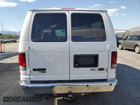 2013 Ford Econoline Cargo z VIN 1FDNE3BLXDDA60281, wystawiony jako Copart lot #63598215 z przebiegiem 128 780 mil mil oraz Szkoda całkowita • Salvage title. Historia ofert i sprzedaży dostępna na DreamBid. Obrazek 6.