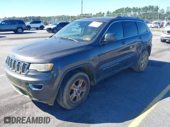 2017 Jeep Grand Cherokee Laredo z VIN 1C4RJEAG1HC845849, wystawiony jako IAAI lot #43457425 z przebiegiem 106 162 mil mil oraz . Historia ofert i sprzedaży dostępna na DreamBid. Obrazek 2.
