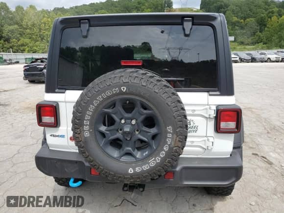 2023 Jeep Wrangler with VIN 1C4JJXN63PW672536, listed as a Copart auction lot 68909825 with 26,143 mi miles and Salvage title. Bid and sale history available at DreamBid. Image 6.
