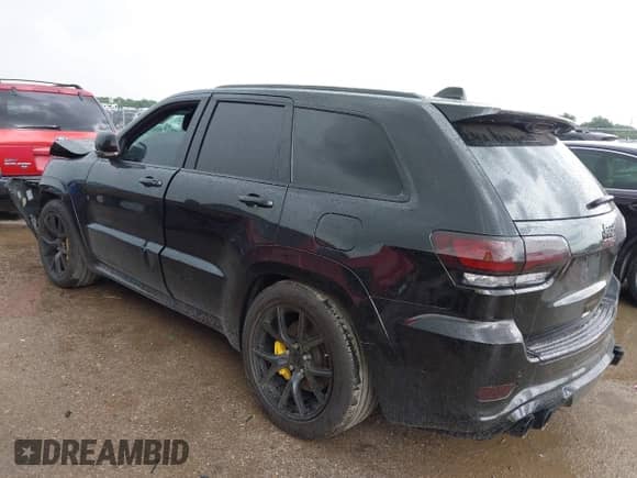 2020 Jeep Grand Cherokee Trackhawk with VIN 1C4RJFN9XLC419054, listed as a IAAI auction lot 42586248 with 42,206 mi miles and . Bid and sale history available at DreamBid. Image 3.