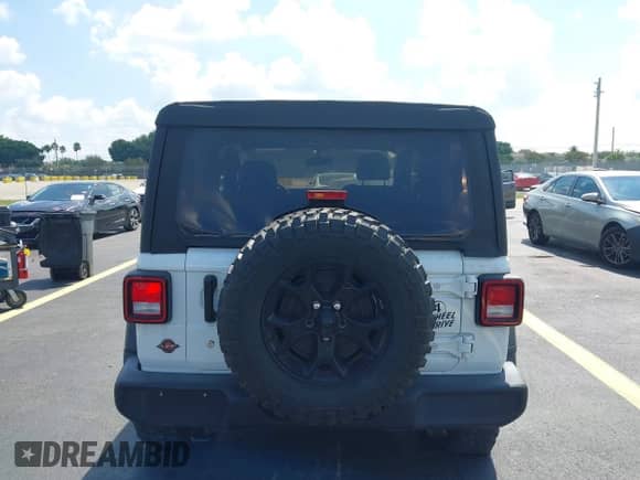 2021 Jeep Wrangler Sport S with VIN 1C4GJXAN4MW804495, listed as a IAAI auction lot 43051939 with 36,306 mi miles and . Bid and sale history available at DreamBid. Image 16.