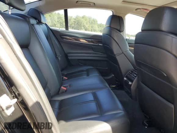 2012 BMW 7 Series 750i xDrive с VIN WBAKC6C50CC397154, выставлен на аукционе Copart как лот 66981905 с пробегом 162 379 миль миль и Списание • Salvage title. История ставок и продаж доступна на DreamBid. Изображение 10.