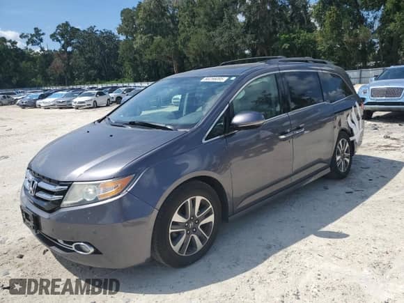 2016 Honda Odyssey Touring Elite z VIN 5FNRL5H94GB024134, wystawiony jako Copart lot #80256095 z przebiegiem 136 974 mil mil oraz Szkoda całkowita • Salvage title. Historia ofert i sprzedaży dostępna na DreamBid. Obrazek 1.