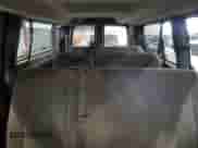 2017 Chevrolet Express Passenger LT z VIN 1GAZGPFG4H1177374, wystawiony jako Copart lot #81664784 z przebiegiem 248 250 mil mil oraz Czysty tytuł • Clean title. Historia ofert i sprzedaży dostępna na DreamBid. Obrazek 10.