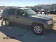 2004 Jeep Grand Cherokee Laredo with VIN 1J4GX48S94C209713, listed as a Copart auction lot 86552655 with 218,042 mi miles and Salvage title. Bid and sale history available at DreamBid. Image 4.