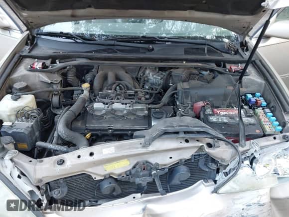 2005 Toyota Camry XLE with VIN 4T1BF30K95U106095, listed as a IAAI auction lot 43321498 with 260,118 mi miles and . Bid and sale history available at DreamBid. Image 10.