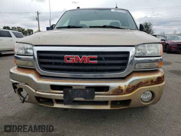 2004 GMC Sierra 1500 SLE z VIN 2GTEC19T841159097, wystawiony jako Copart lot #85414145 z przebiegiem 117 849 mil mil oraz Czysty tytuł • Clean title. Historia ofert i sprzedaży dostępna na DreamBid. Obrazek 5.